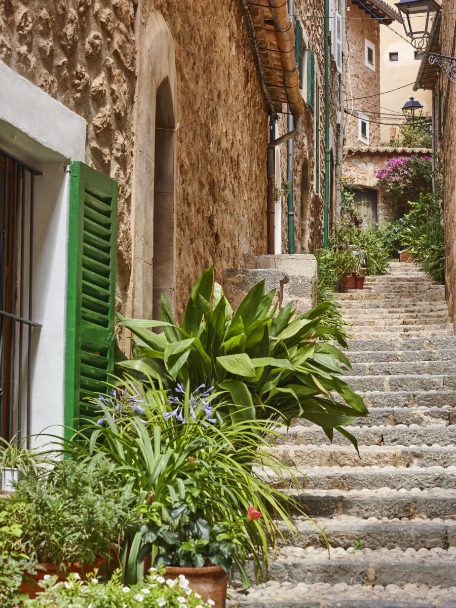 Traditional house facade decorated with plants in Mallorca, Balearic islands